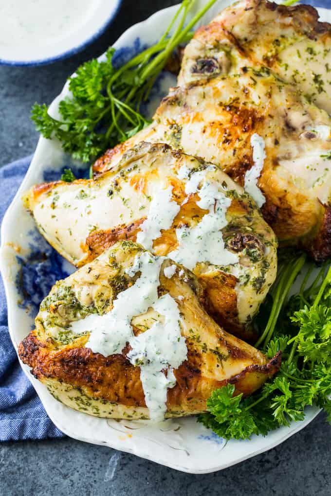 Green Goddess Chicken is marinated in a buttermilk-herb mixture and then roasted.