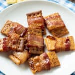 Bacon-Wrapped Crackers on a plate.