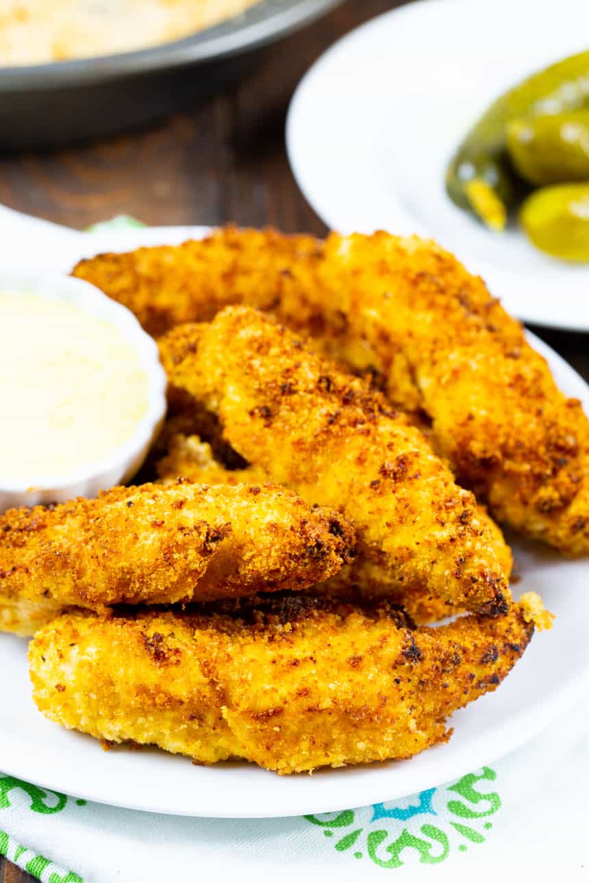 Pickle-Brined Chicken Tenders on a plate with Honey Mustard Dipping Sauce.