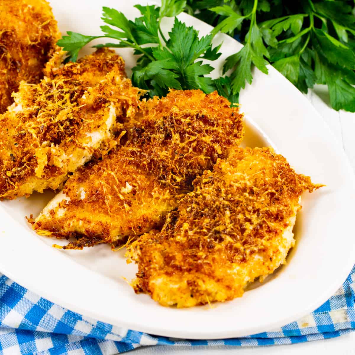 Air Fryer Parmesan Crusted Chicken on a serving platter.
