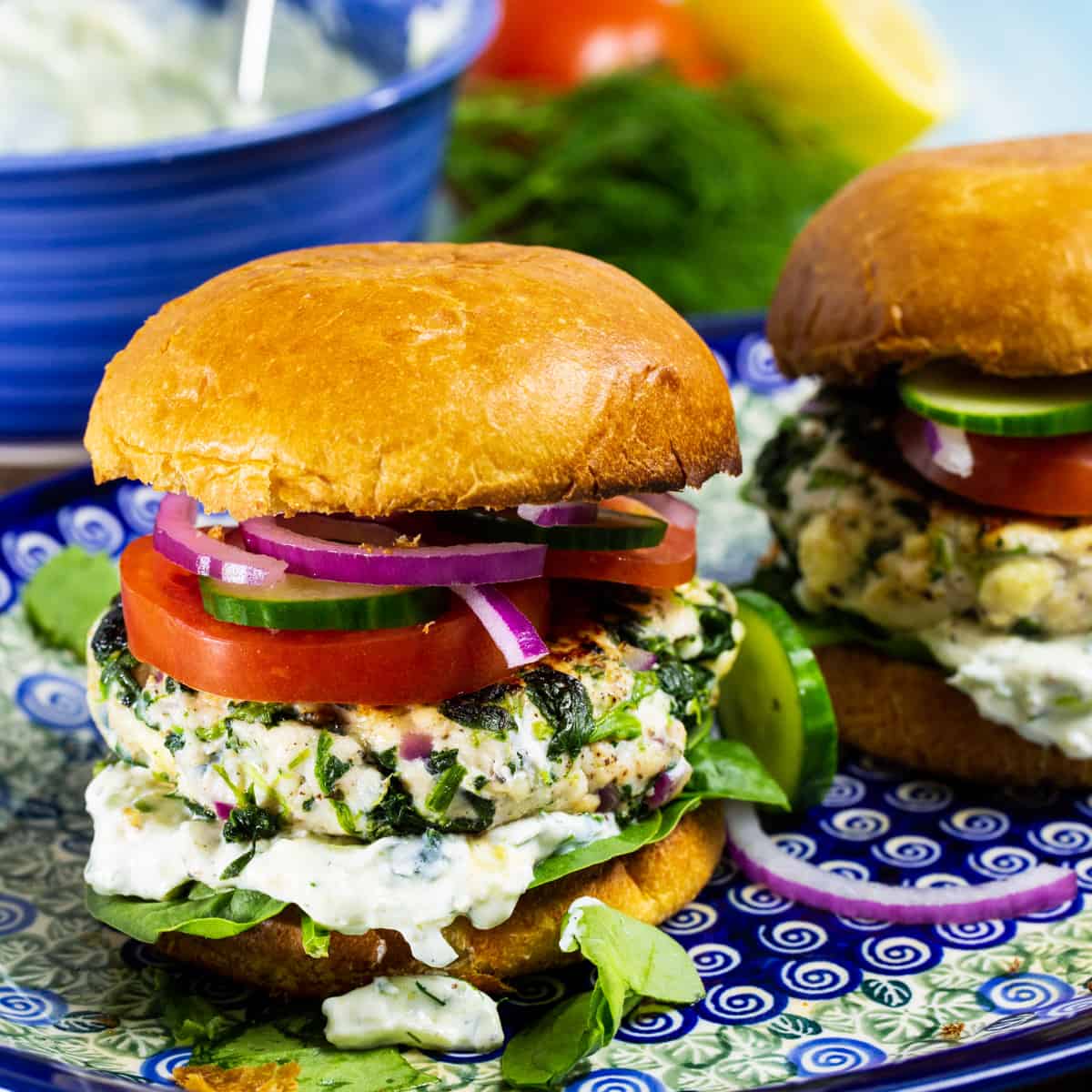 Greek Spinach Chicken Burgers on a plate.